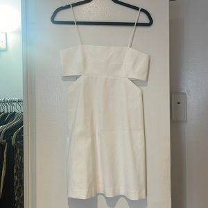 Brand NEW with tags. White mini dress with cut outs